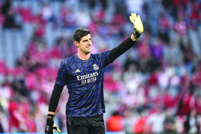 Real Madrid&#039;s Belgian goalkeeper Thibaut Courtois waves ahead the UEFA Champions League semi-final first leg football match between FC Bayern Munich and Real Madrid CF on April 30, 2024 in Munich, southern Germany. (AFP)