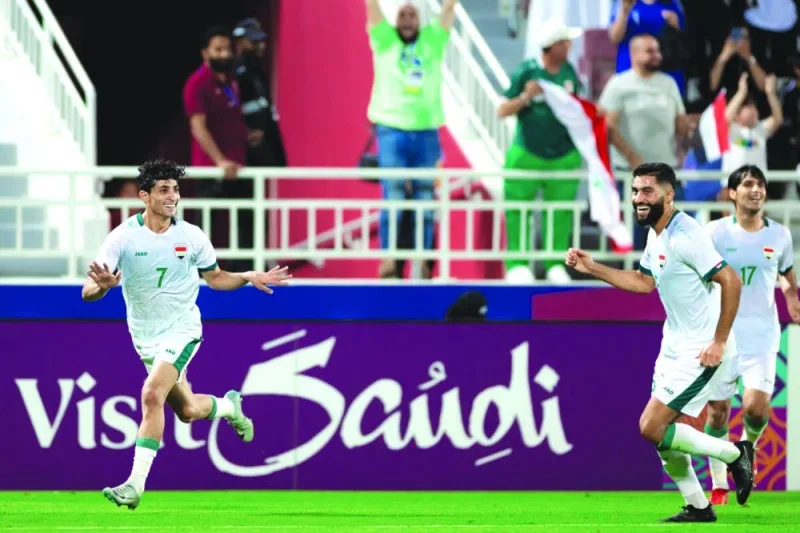 Iraq’s Ali Jasim celebrates after scoring against Indonesia during the AFC U-23 Asian Cup third-place playoff match at the 
Abdullah Bin Khalifa Stadium on Thursday.