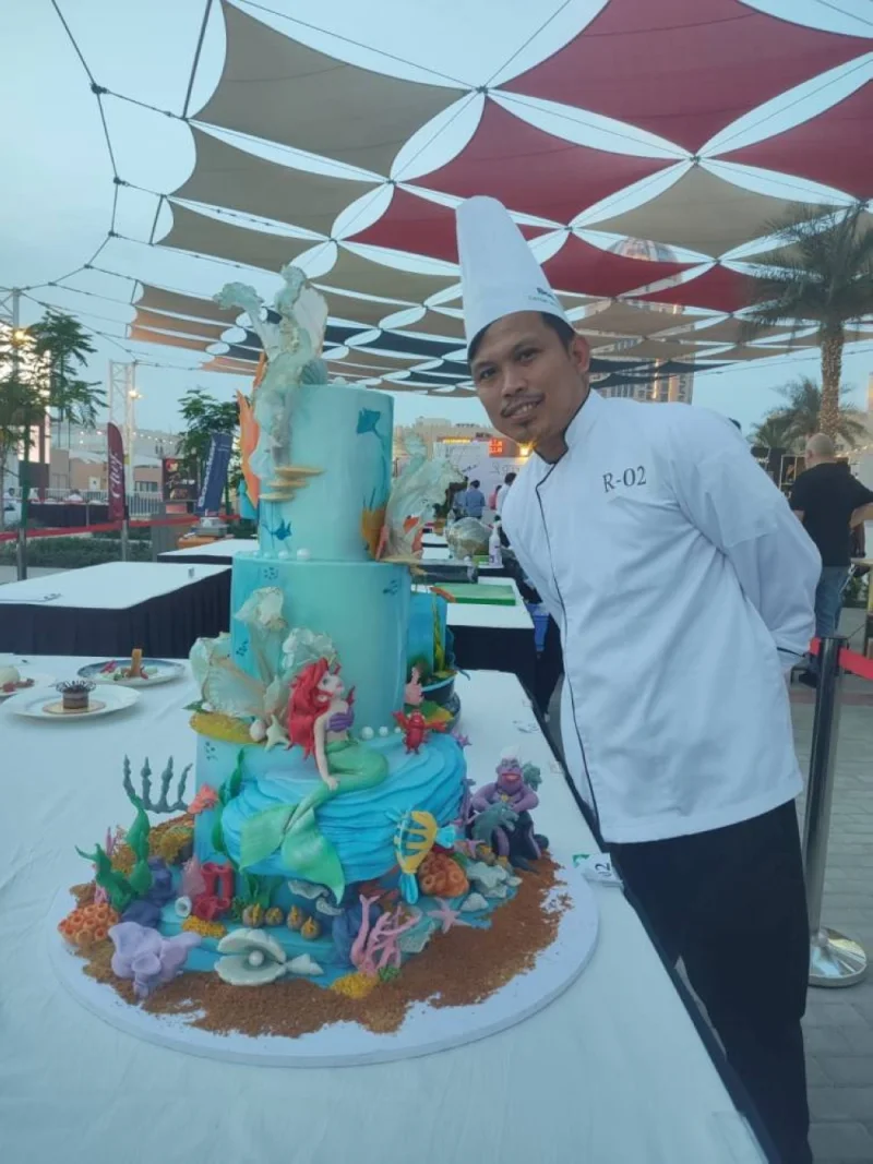 Alexander C Solano showcases his creation at the Qatar Chef Challenge.