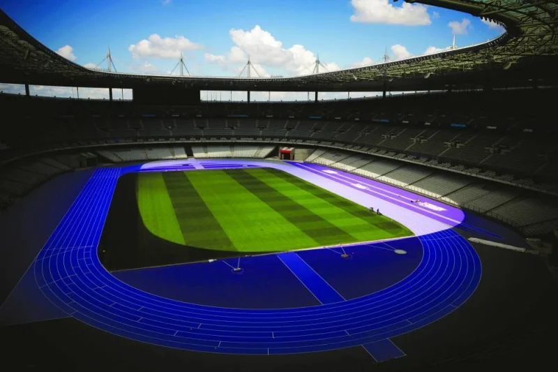 A general view shows the Paris 2024 Olympic and Paralympic Games’ athletics track of two shades of purple inside the Stade de France stadium, in Saint-Denis near Paris, France, on Tuesday. (Reuters)