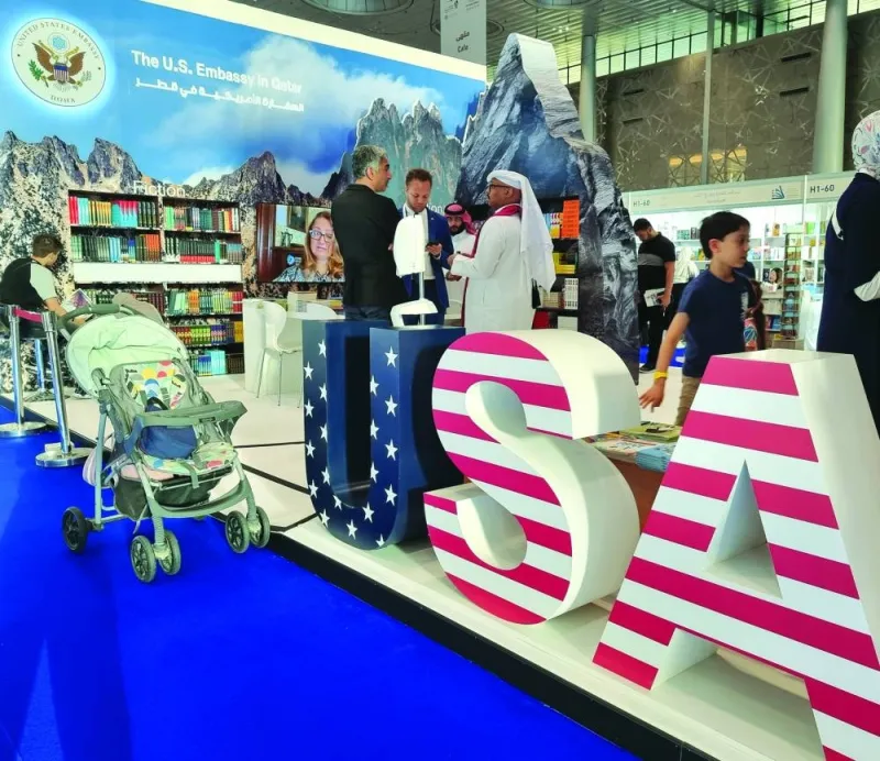 The US embassy booth offers an array of literary works. 