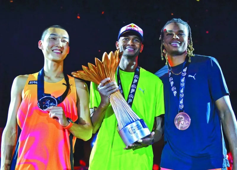 Barshim with runner-up Sanghyeok Woo (left) of South Korea and third-placed American JuVaughn Harrison. PICTURES: Noushad Thekkayil