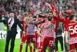 
Olympiakos’ Brazilian defender Rodinei (centre) celebrates with teammates after their victory in the Europa League semi-final second leg match against Aston Villa in Piraeus. (AFP) 
