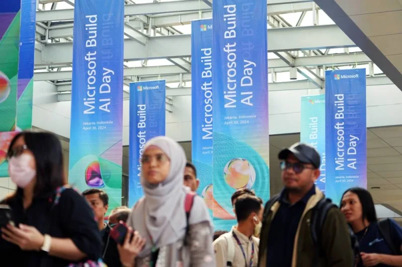Attendees arrive for Microsoft&#039;s event on AI technologies in Jakarta on April 30, 2024. Microsoft will invest $1.7bn to build out cloud computing and artificial intelligence infrastructure in Indonesia, betting on Southeast Asia’s biggest economy to spur growth.