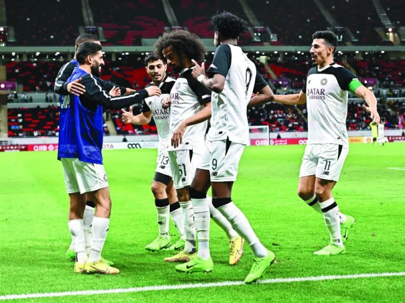 Al Sadd’s Akram Afif (third right) celebrates with teammates after scoring against Al Duhail in the Amir Cup semi-final at the Ahmad Bin Ali Stadium on Saturday. PICTURE: Noushad Thekkayil