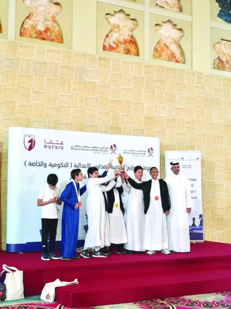 
Mohamed al-Mudahka, President of Qatar Chess Association, is seen with prize winners in the first edition of the Primary School Chess Championship held in partnership with the Ministry of Sports and Youth, and the Ministry of Education and Higher Education. 