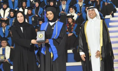 HE the Minister of Education and Higher Education Buthaina bint Ali al-Jabar al-Nuaimi honouring a high achiever as UDST president Dr Salem al-Naemi looks on. PICTURES: Shaji Kayamkulam.