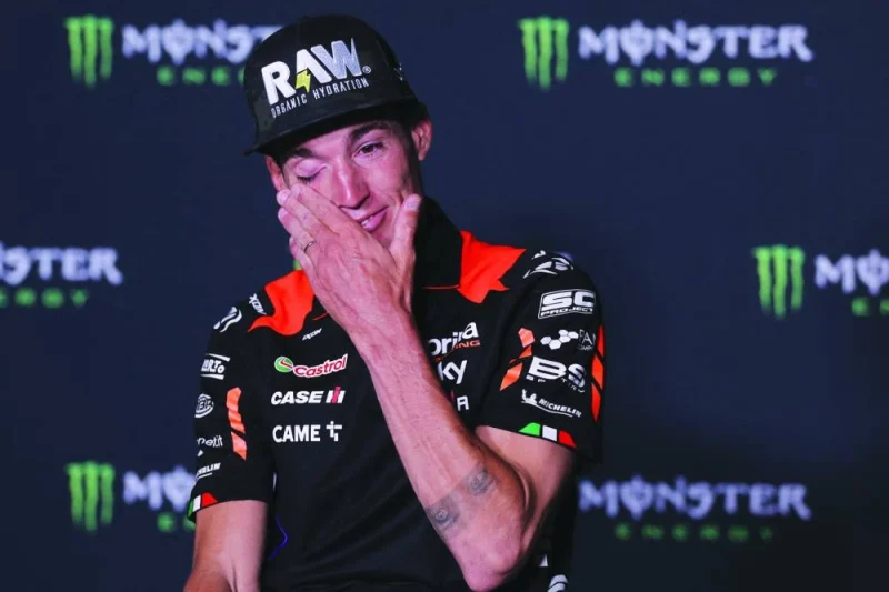 Aprilia Spanish rider Aleix Espargaro gets emotional after announcing his retirement from MotoGP at the end of the 2024 season, during a press conference at the Catalunya racetrack in Montmelo, near Barcelona, on Thursday. (AFP)