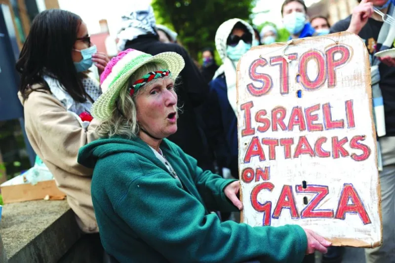 Protesters demonstrate in support of Palestinians, at Oxford University, Britain, yesterday
