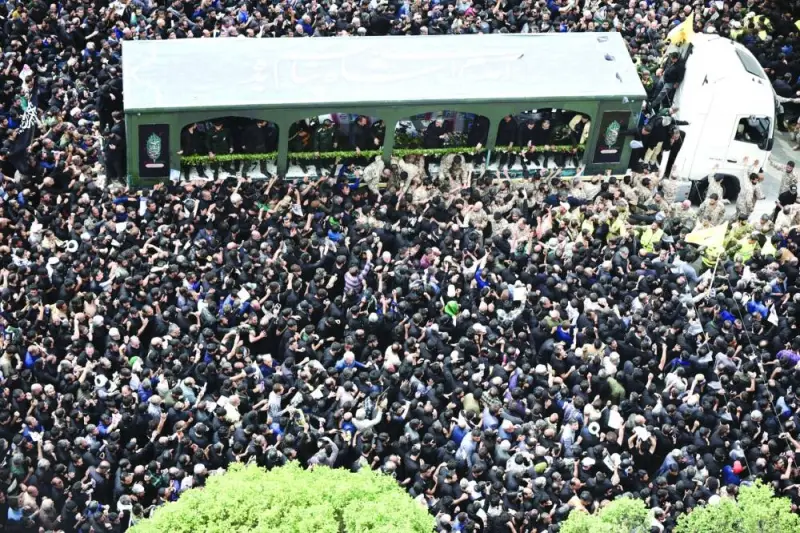 Mourners attend the funeral of late president Ebrahim Raisi in the city of Mashhad.