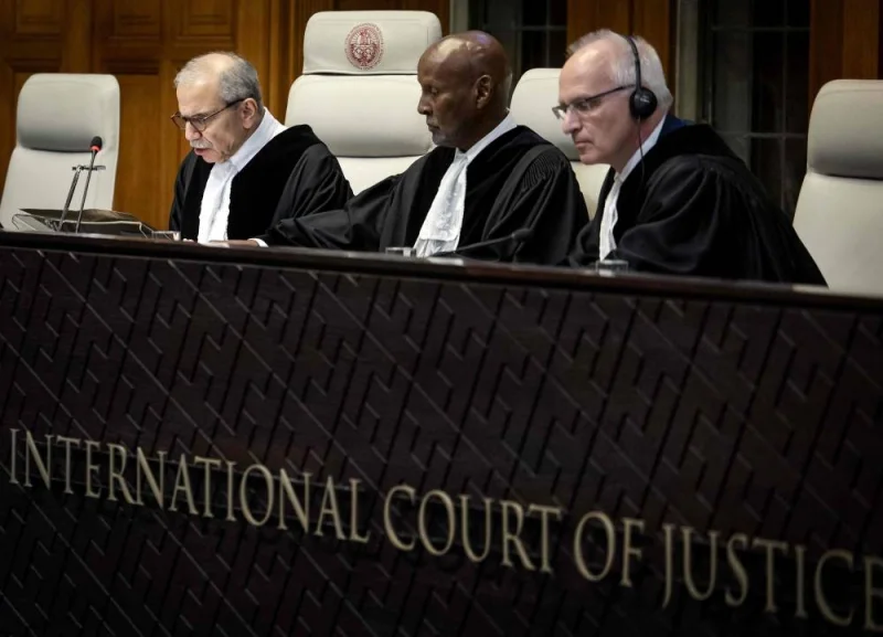 (From L) Judge Nawaf Salam, Judge Abdulqawi Ahmed Yusuf and Judge Georg Nolte attend a hearing at the International Court of Justice (ICJ) as part of South Africa&#039;s request on a Gaza ceasefire in The Hague. AFP