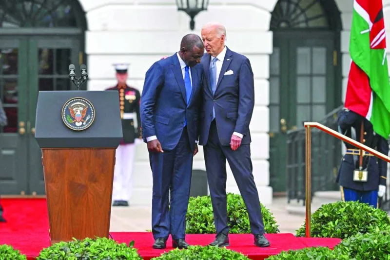 US President Joe Biden speaks with Kenyan President William Ruto during an official arrival ceremony on the South Lawn of the White House in Washington, DC. Ruto's visit is the first state visit to Washington by an African leader in more than 15 years.