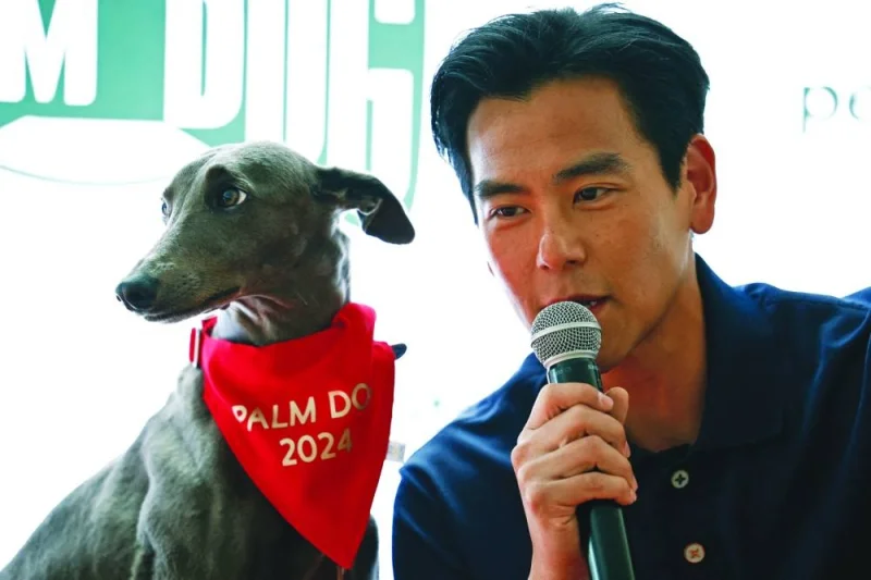 
Eddie Peng, cast member of the film Black Dog, speaks after the dog Xin won the Grand Prix Palme Dog award. 