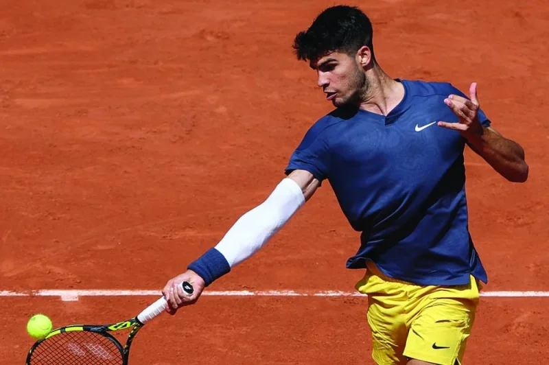 Spain’s Carlos Alcaraz Garfia plays a forehand return to US’ Jeffrey John Wolf during their match on day one of the French Open in Paris on Sunday. (AFP)