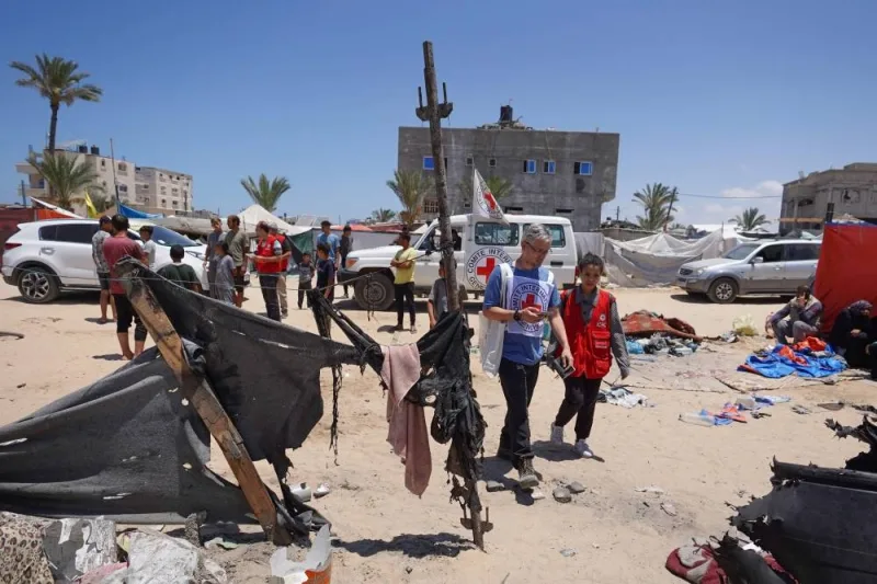 A delegation of the International Committee of the Red Cross (ICRC) inspects a makeshift displacement camp in Rafah&#039;s Mawasi area in the southern Gaza Strip on Wednesday, a site that was reportedly hit during Israeli bombardment. AFP