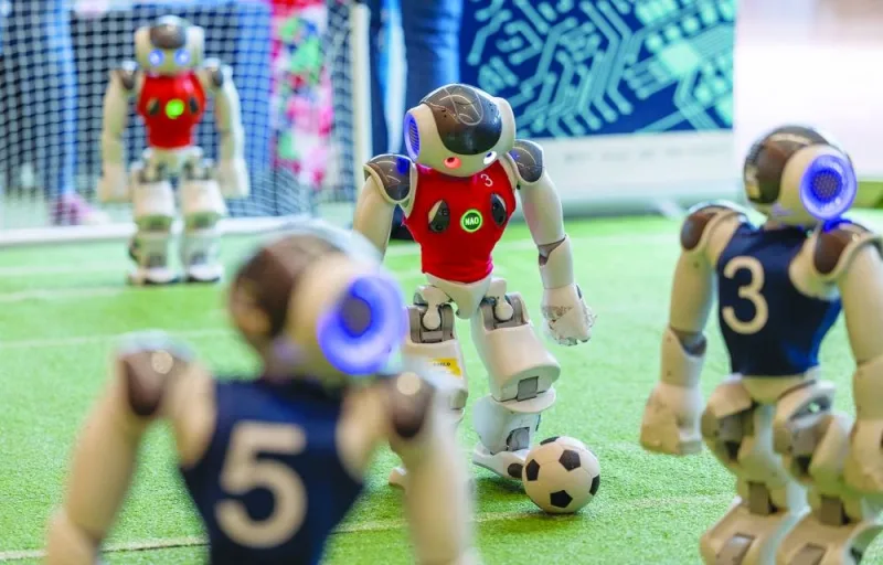 Nao robots of the Nomadz team, programmed by the ETHZ and Insait Bulgaria, play a game of soccer during the AI for Good Global summit on artificial intelligence, organised by the International Telecommunication Union (ITU), in Geneva, Switzerland, May 30, 2024. REUTERS/Denis Balibouse