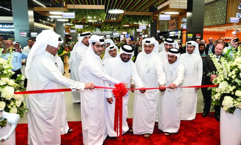Distinguished dignitaries lead the ribbon-cutting ceremony held during the inaugural opening of Al Meera&#039;s newest flagship branch in Umm Al Seneem, near the Ain Khaled district. PICTURE: Shaji Kayamkulam.