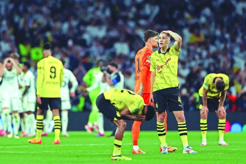 Borussia Dortmund’s players react after losing the Champions League final on Saturday. (AFP)