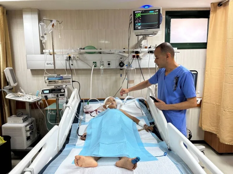 An injured child, Tawfik Abu Youssef, lies on bed, in Al-Aqsa Martyrs Hospital, in the aftermath of an Israeli strike, in Deir Al-Balah, in the central Gaza Strip, on Saturday. REUTERS