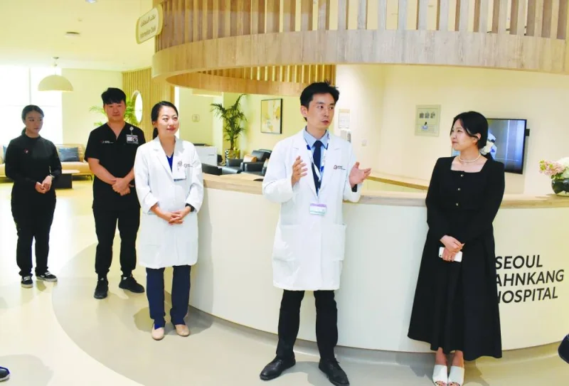 Hospital staff explaining the facilities. PICTURE: Thajudheen