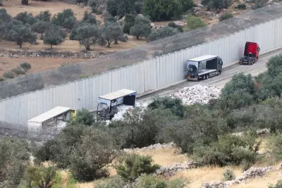A view of trucks carrying aid to Gaza that were stopped after they were damaged by Israeli settlers near a checkpoint near Hebron in the Israeli-occupied West Bank on May 14. REUTERS