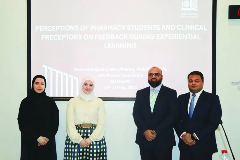 Graduate Dania Ihsan Walid Alkhiyami with other faculty members.