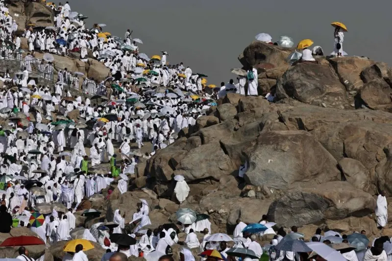 Pilgrims pray at dawn on Saudi Arabia&#039;s Mount Arafat, also known as Jabal al-Rahma or Mount of Mercy, during the climax of the Haj pilgrimage on Saturday. AFP