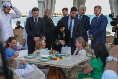 HE Minister of State for International Cooperation Lolwah Al-Khater welcomes Ukrainian children and their families in Doha (File)