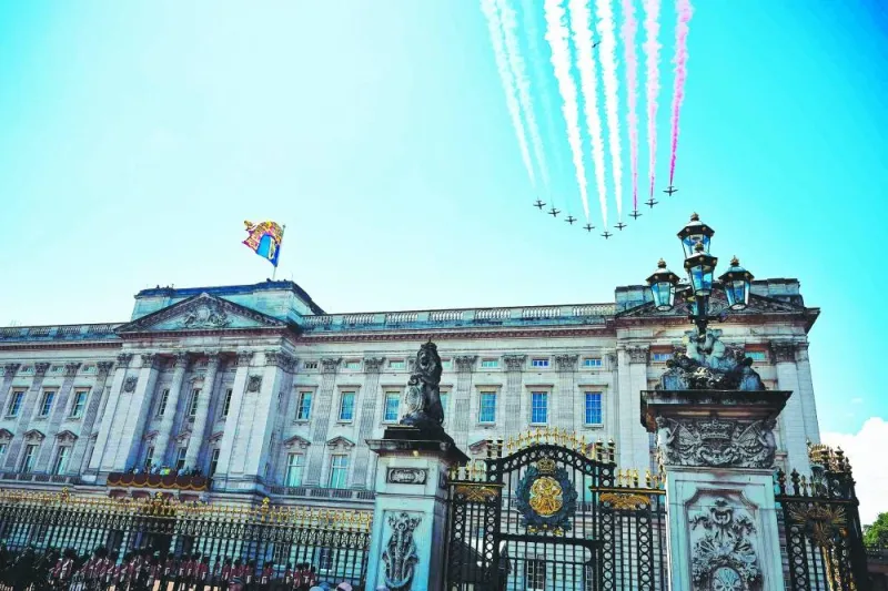 The British Royal Air Force's (RAF) aerobatic team, the 'Red Arrows' perform a flypast over Buckingham Palace.