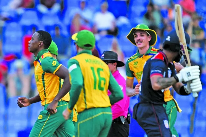South Africa’s Kagiso Rabada (left) celebrates after USA’s Nitish Kumar was caught out during the ICC Twenty20 World Cup match against the United States at Sir Vivian Richards Stadium in North Sound, Antigua and Barbuda, on Wednesday. (AFP)