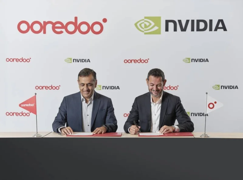 Ooredoo Group CEO Aziz Aluthman Fakhroo and NVIDIA senior vice president of Telecom Ronnie Vasishta signing the agreement during TMForum’s DTW24 in Copenhagen. 