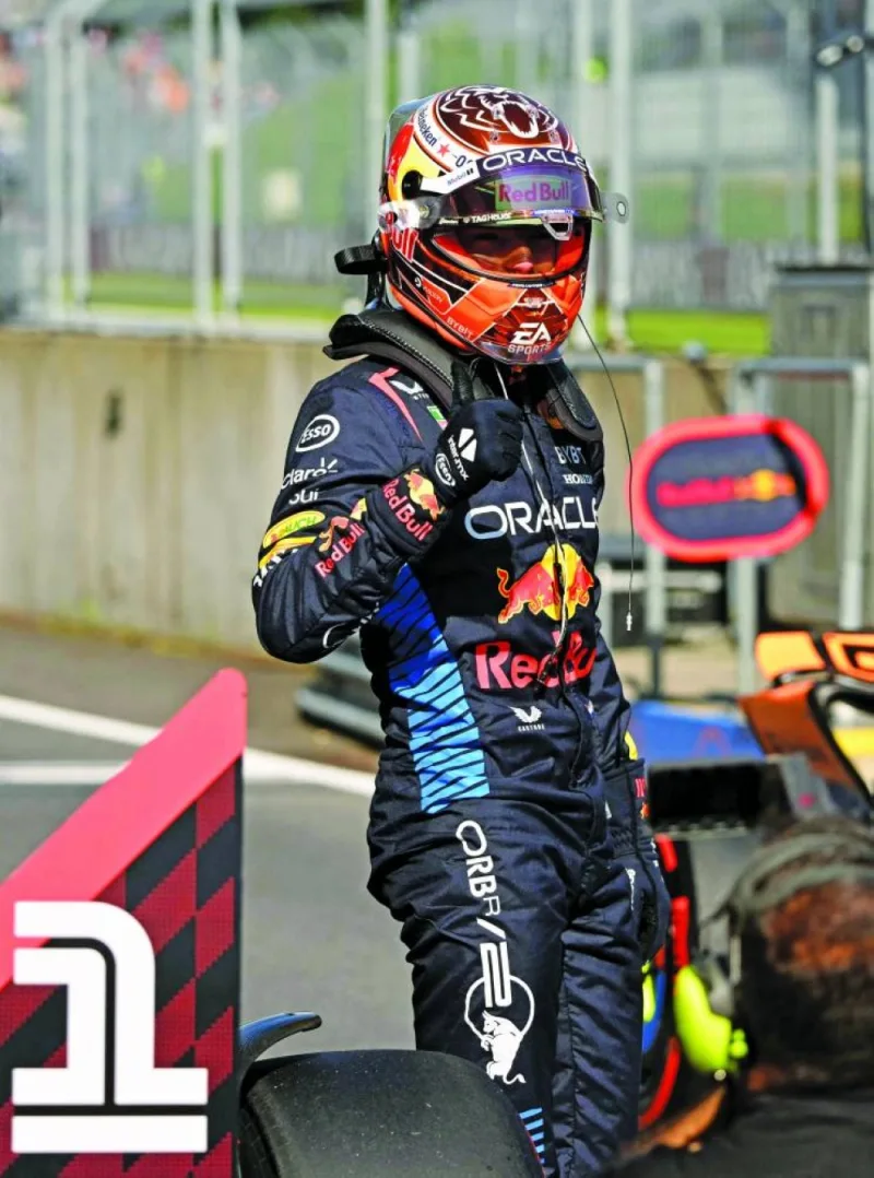 Red Bull Racing’s Dutch driver Max Verstappen celebrates taking the sprint pole position after the sprint qualifying session on the Red Bull Ring race track in Spielberg, Austria, on Friday, ahead of the Formula One Austrian Grand Prix. (AFP)