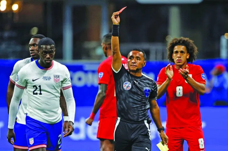 
Salvadoran referee Ivan Barton shows a red card to USA’s forward Timothy Weah (left) during the Conmebol 2024 Copa America tournament Group C match against Panama in Atlanta, Georgia. (AFP) 