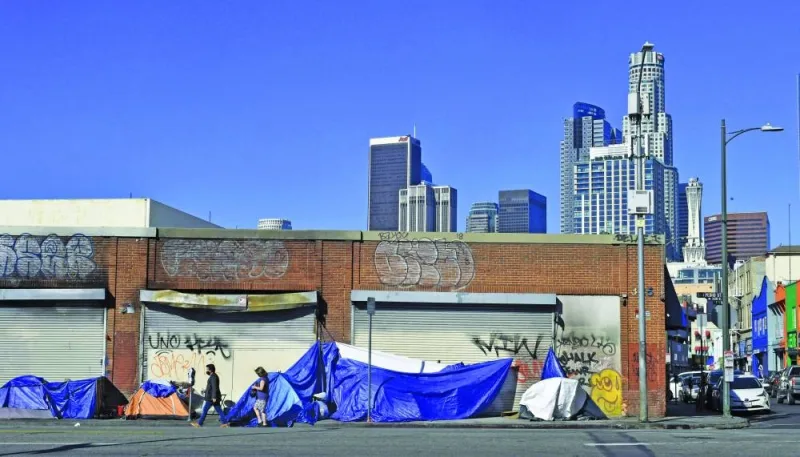 
This 2022 file picture shows tents housing the homeless in front of closed storefronts near downtown Los Angeles. – AFP 