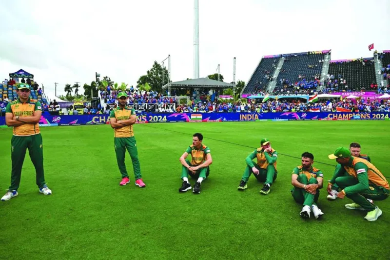South African players wait on the field after losing the ICC Twenty20 World Cup 2024 final against India at Kensington Oval in Bridgetown, Barbados, on Saturday. (AFP)
