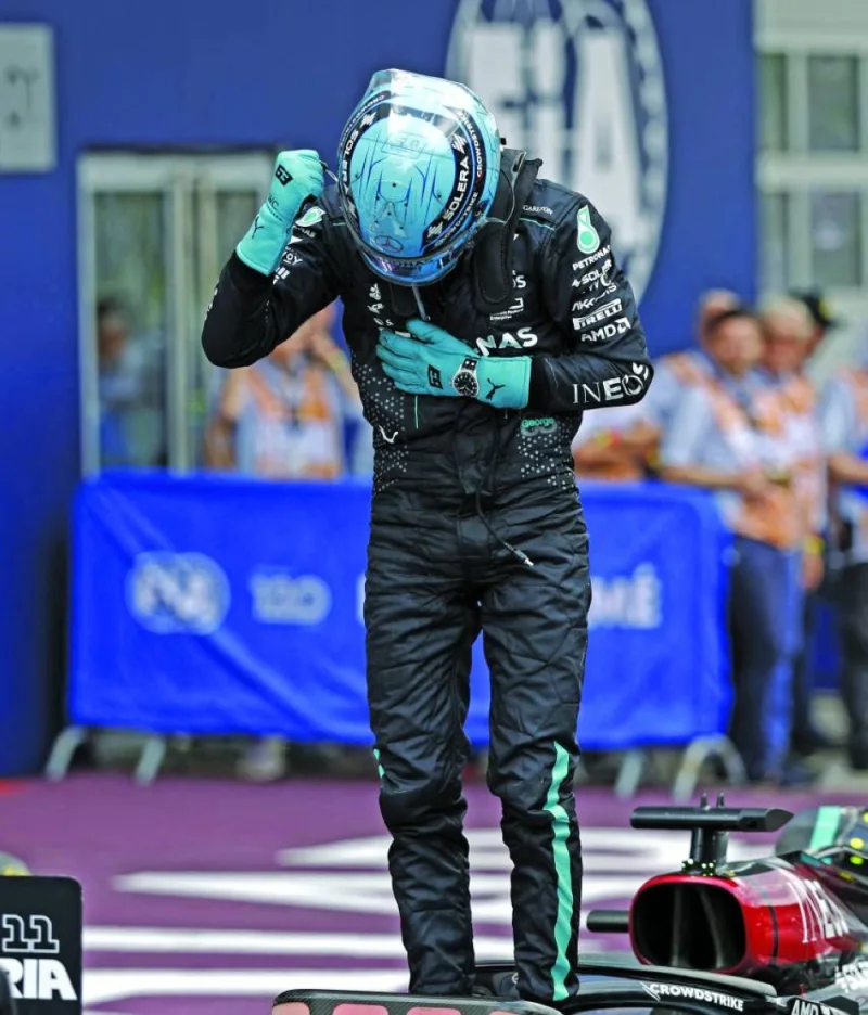 Mercedes&#039; British driver George Russell reacts after winning the Formula One Austrian Grand Prix on the Red Bull Ring race track in Spielberg, Austria, yesterday. (AFP) 