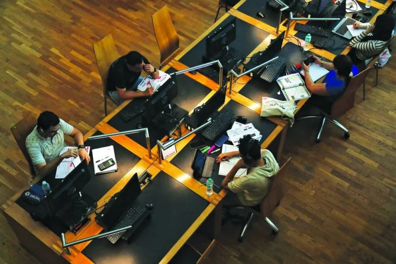 A picture taken on June 28, 2024 in the Mediterranean city of Alexandria, shows Egyptian high school students keeping cool by studying in the Alexandria Library, as Egypt began implementing planned power cuts in an attempt to ease the load on the local electricity networks as energy consumption surges during the hot summer months.