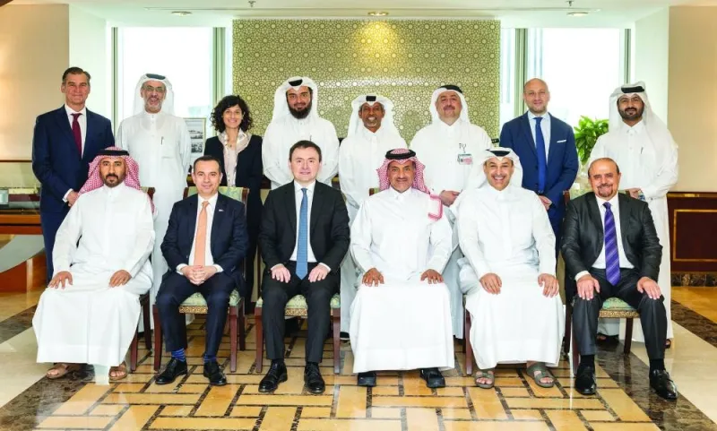 Mansur Zhakupov, TotalEnergies country chair and managing director of TotalEnergies EP Qatar, with Sheikh Khalid bin Khalifa al-Thani, CEO, QatarEnergy LNG and other senior executives.