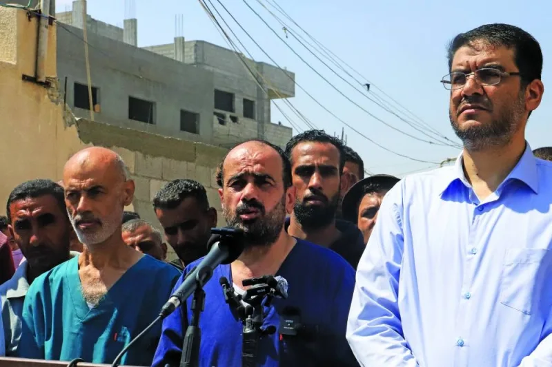 
Al-Shifa hospital director Mohamed Abu Salmiya who was detained by Israeli forces since November, makes a statement after his release alongside other detainees, at Nasser hospital in Khan Yunis in the southern Gaza Strip, yesterday. 