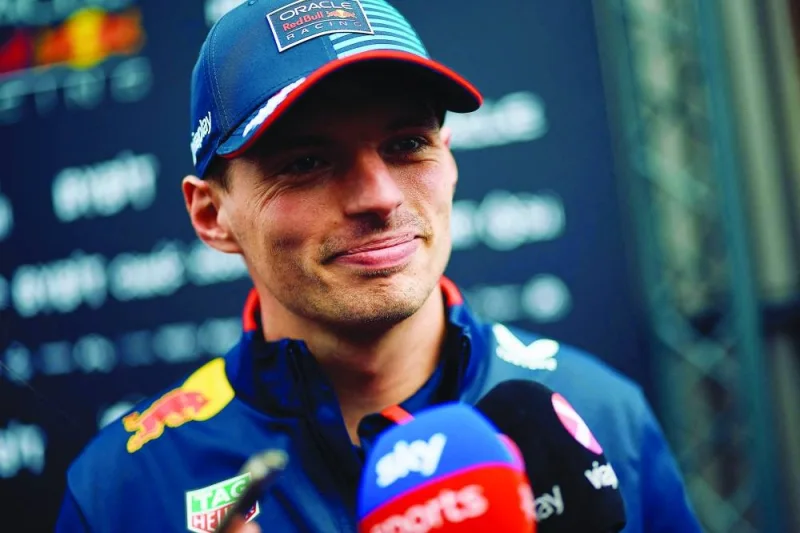 Red Bull Racing's Dutch driver Max Verstappen smiles while speaking to reporters at the Silverstone motor racing circuit in Silverstone, central England, on July 4, 2024 ahead of the Formula One British Grand Prix. (Photo by BENJAMIN CREMEL / AFP)