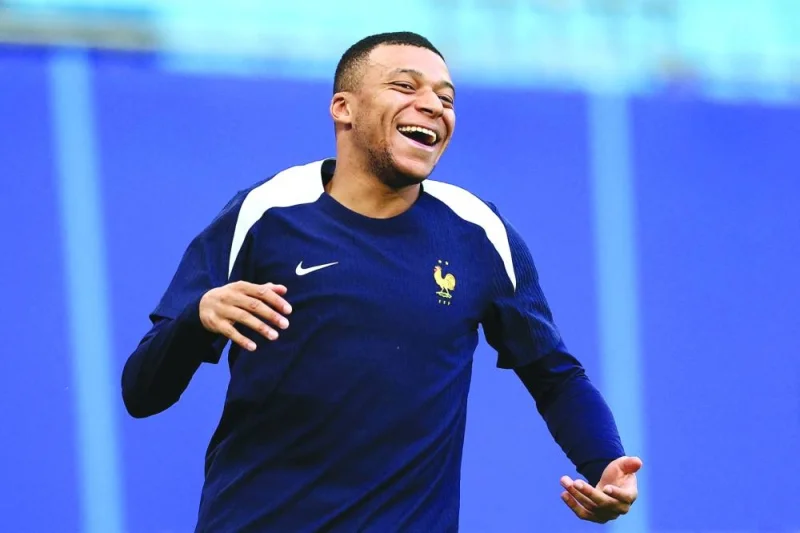 France’s Kylian Mbappe attends a training session at the Volksparkstadion in Hamburg on Thursday. (AFP)