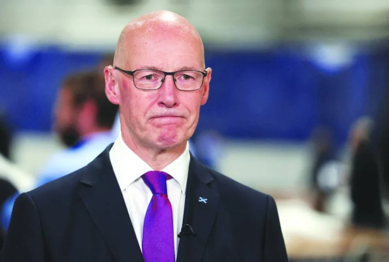First Minister of Scotland John Swinney reacts following the result of the election count in Perth, Scotland, Britain on Friday. (Reuters)