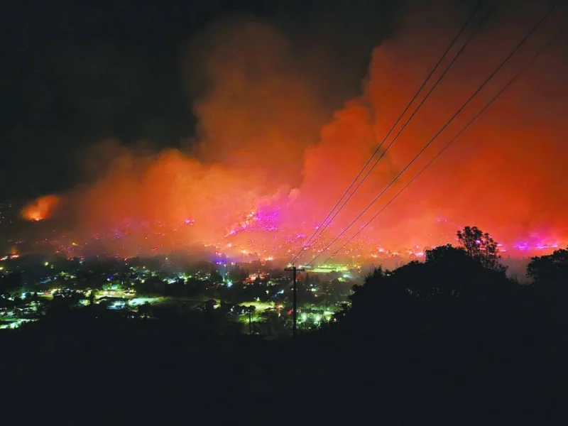 This image taken from social media shows fire and smoke rising from the French Fire in Mariposa, California. (Reuters)