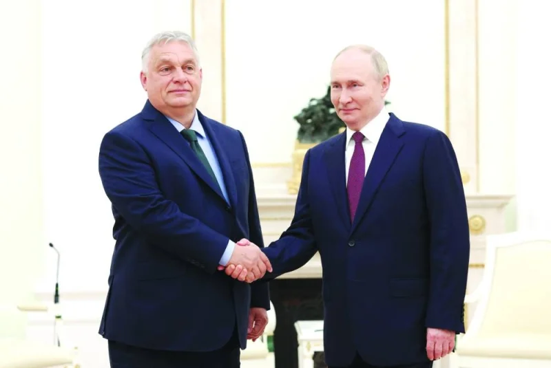 This pool photograph distributed by the Russian state agency Sputnik shows Putin with Orban at the Kremlin. – AFP