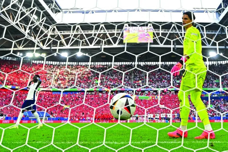 Switzerland’s goalkeeper Yann Sommer concedes a penalty goal by England’s forward Bukayo Saka during the UEFA Euro 2024 quarter-final at the Duesseldorf Arena in Duesseldorf. (AFP)