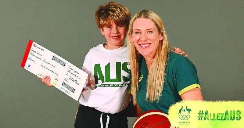 
Australian basketball star Lauren Jackson and her son pose with a symbolic boarding pass in Sydney ahead of the Paris Olympic Games. Twelve years after Jackson was an Australian Olympic flag bearer and led the Opals to a fourth-consecutive Olympic medal, she’s back for more at Paris 2024. (@AUSOlympicTeam) 