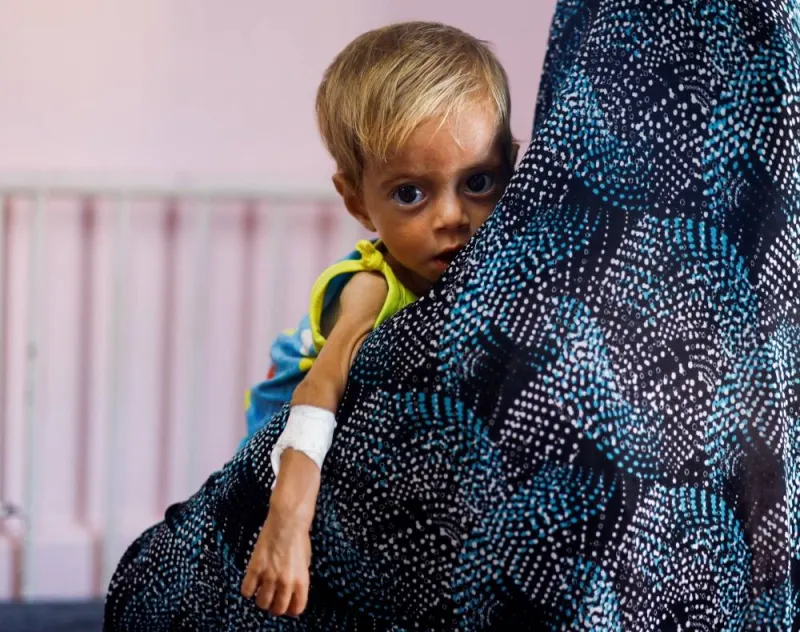 A child looks on at Nasser hospital in Khan Younis, in the southern Gaza Strip, Monday. REUTERS