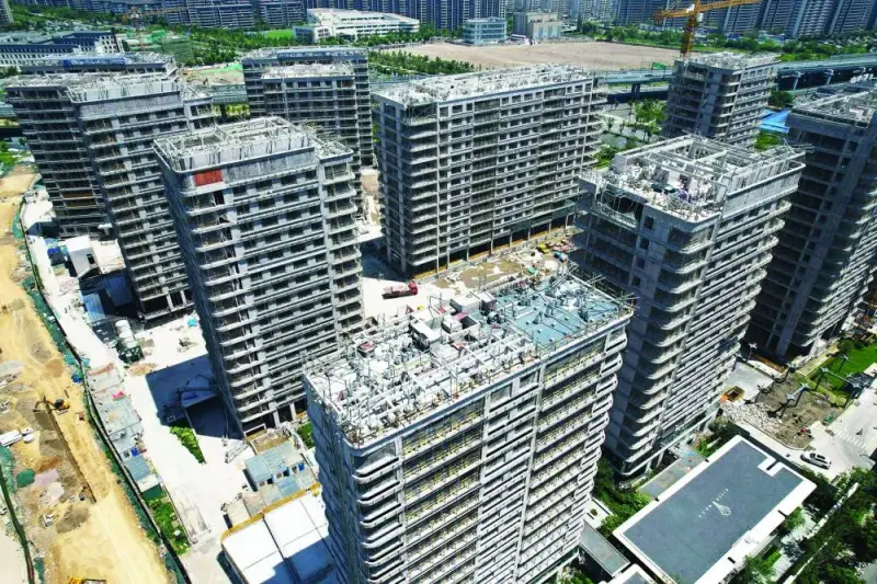 A general view of an under-construction residential housing complex in Hangzhou in China’s eastern Zhejiang province. China posted lower than expected growth in the second quarter yesterday.