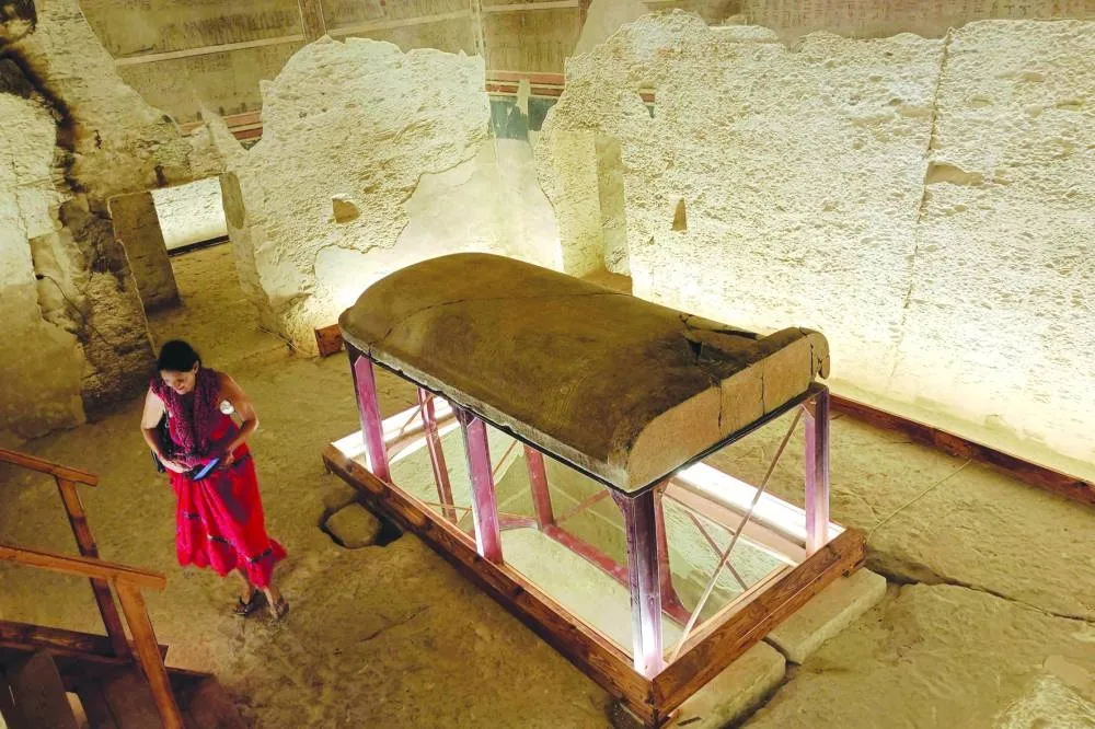 A tourist visits the tomb of King Amenhotep III in the Valley of the Kings near the city of Luxor, yesterday, after it was officially opened to the public.