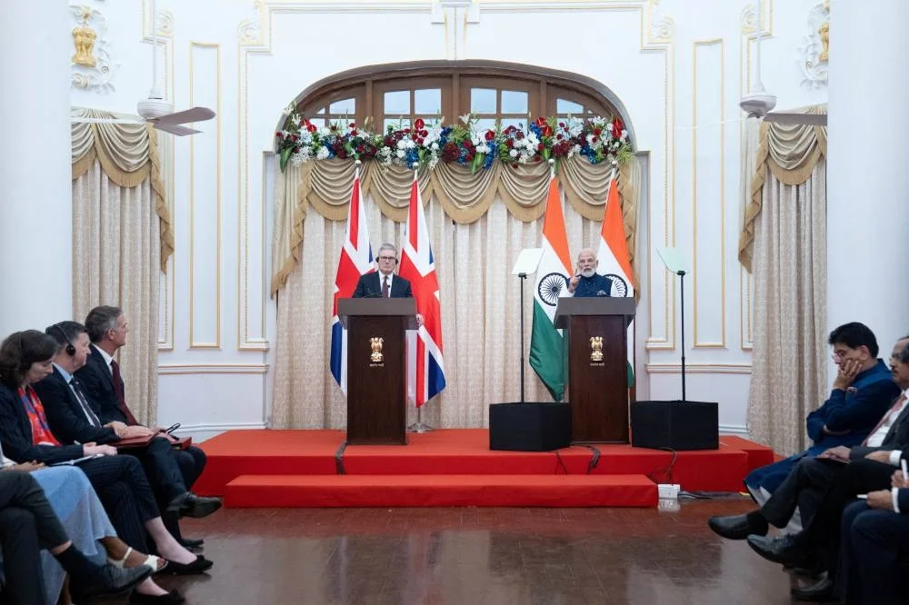 British Prime Minister Keir Starmer and Indian Prime Minister Narendra Modi issue press statements after holding meetings at Raj Bhavan, in Mumbai, India, October 9, 2025.    Stefan Rousseau/Pool via REUTERS
